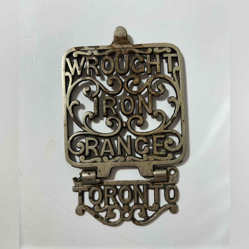 Antique Wrought Iron Range Company 1918
Two piece Trivet Made in Toronto